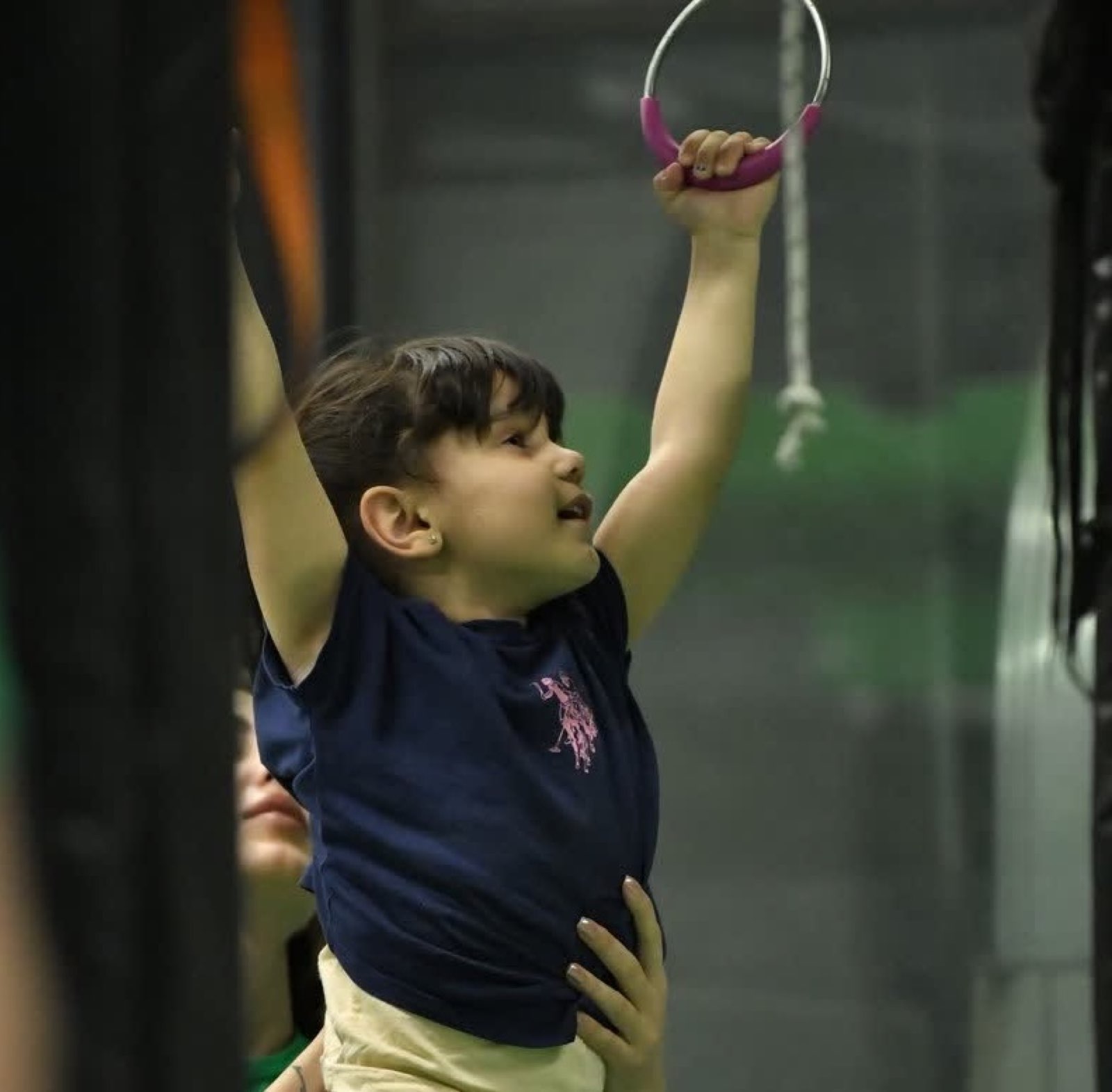 Kids on the Jungle Gym climbing structures at Gymnasia.